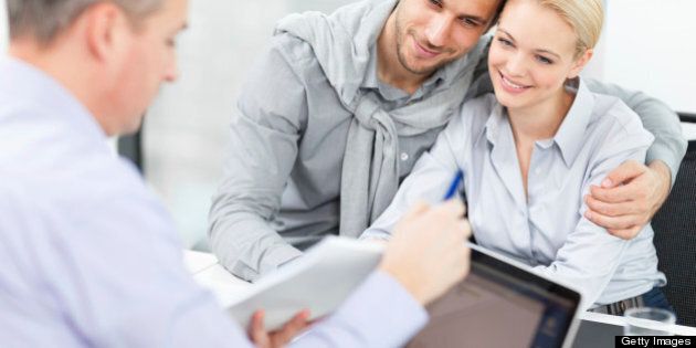 Young couple at meeting with financial advisor
