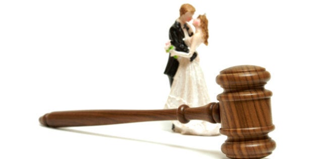 a gavel with a bride and groom...