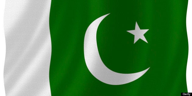 Flag of pakistan waving with highly detailed textile texture pattern