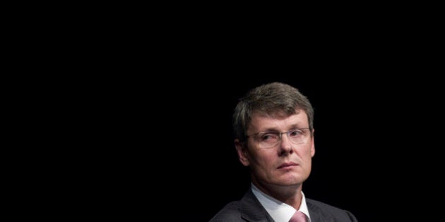 Thorsten Heins, chief executive officer of BlackBerry, listens during the company's annual general meeting in Waterloo, Ontario, Canada, on Tuesday, July 9, 2013. BlackBerrys chances of becoming a viable contender to Apple Inc. and Google Inc. in the smartphone market are dimming amid lackluster demand for its flagship touch-screen device. Photographer: Pawel Dwulit/Bloomberg via Getty Images