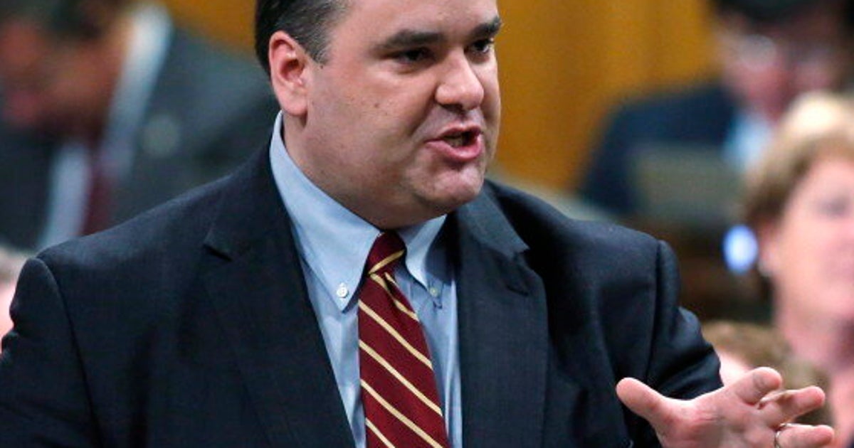 James Moore, Industry Minister, Says Wireless Battle Will Go On