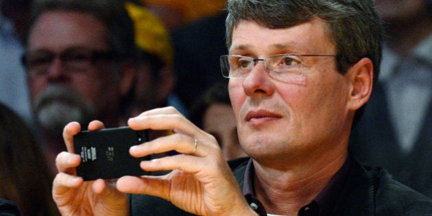 LOS ANGELES, CA - NOVEMBER 16: Thorsten Heins, chief executive officer of Research in Motion, takes a picture with a mobile device during the Los Angeles Lakers and Phoenix Suns NBA basketball game at Staples Center on November 16, 2012 in Los Angeles, California. NOTE TO USER: User expressly acknowledges and agrees that, by downloading and or using this photograph, User is consenting to the terms and conditions of the Getty Images License Agreement. (Photo by Kevork Djansezian/Getty Images)