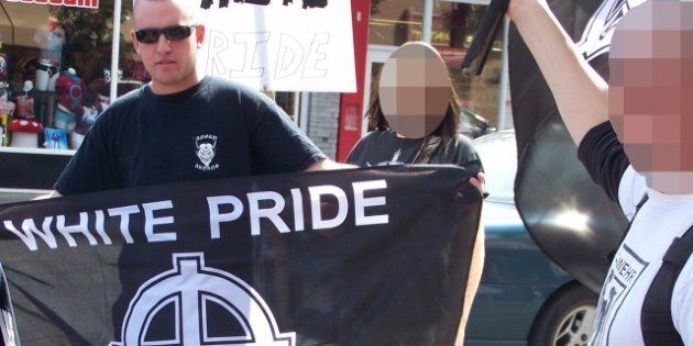 Description Members of the Alberta-based neo-nazi group Aryan Guard stage a counter-protest, at an anti-racism rally. They are seen here ...