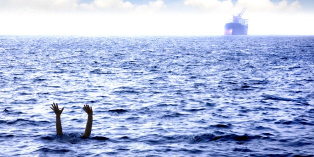 man drowning in the sea and...