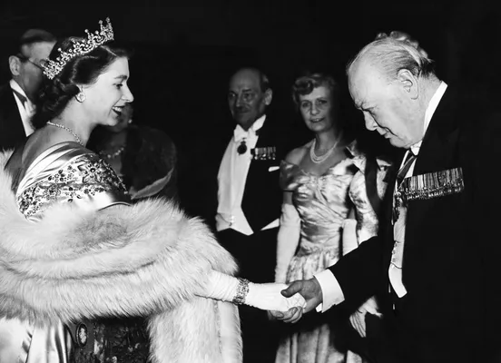 Queen Elizabeth II, French Prime Minister Dominique de Villepin (left) and  Canadian Prime Minister Stephen Harper (centre) attend a ceremony to mark  the 90th anniversary of the Battle of Vimy Ridge, in