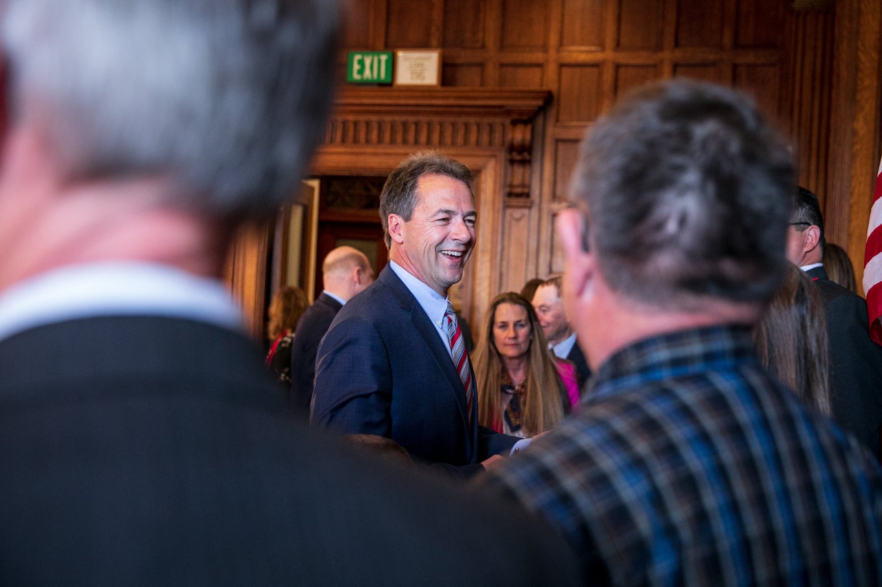 Bullock after signing several bills into law, including the one for Medicaid expansion in his state.