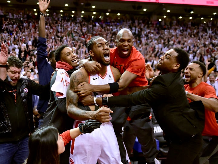 Kawhi Leonard celebrates his historic buzzer-beater.