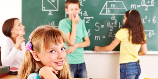 school child with teacher in...