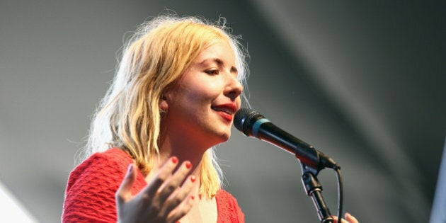 INDIO, CA - APRIL 11: Musician Katie Stelmanis of Austra performs onstage during day 1 of the 2014 Coachella Valley Music & Arts Festival at the Empire Polo Club on April 11, 2014 in Indio, California. (Photo by Imeh Akpanudosen/Getty Images for Coachella)