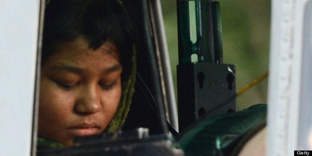 (FILES) In this photograph taken on September 8, 2012 Rimsha Masih, a Christian girl accused of blasphemy sits in helicopter after her release from jail in Rawalpindi. A Pakistan court on November 20, 2012 threw out all charges against a Christian girl accused of blasphemy in a case that drew international condemnation, lawyers said. Rimsha Masih spent three weeks on remand in an adult jail after she was arrested on August 16 for allegedly burning pages from the Koran in a case that prompted worldwide condemnation. AFP PHOTO/FILES/Farooq NAEEM (Photo credit should read FAROOQ NAEEM/AFP/Getty Images)