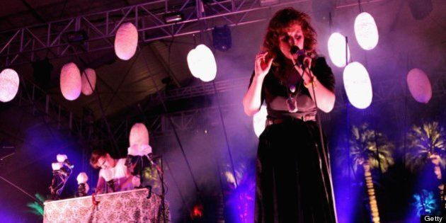 INDIO, CA - APRIL 12: Singer Megan James of Purity Ring performs onstage during day 1 of the 2013 Coachella Valley Music & Arts Festival at the Empire Polo Club on April 12, 2013 in Indio, California. (Photo by Karl Walter/Getty Images for Coachella)