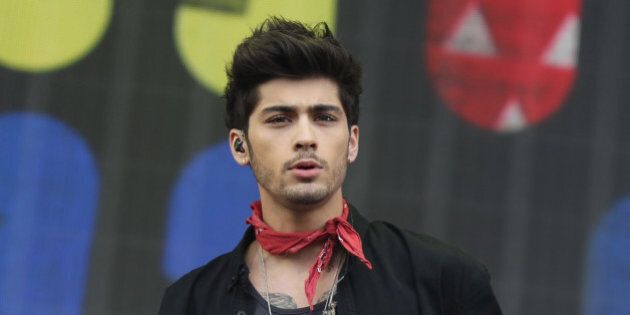 Zayn Malik of One Direction performs on stage during the BBC Radio 1 Big Weekend Festival in Glasgow, Scotland.