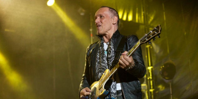 BARCELONA, SPAIN - JUNE 24: Vivian Campbell of Def Leppard performs on stage at Poble Espanyol on June 24, 2013 in Barcelona, Spain. (Photo by Jordi Vidal/Redferns via Getty Images)