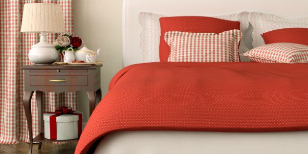 bedroom decorated in red...