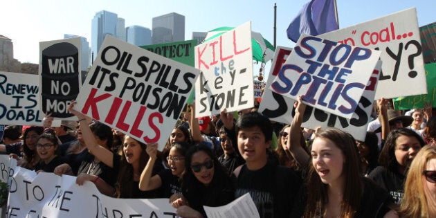 LOS ANGELES, CA - FEBRUARY 17: Demonstrators converge at City Hall during the 'Forward on Climate' rally to call on President Obama to take strong action on the climate crisis on February 17, 2013 in Los Angeles, California. Organizers say the rally, which is led by Tar Sands Action Southern California and Sierra Club, is composed of a coalition of over 90 groups and coincides with similar rallies in Washington D.C. and other U.S. cities. (Photo by David McNew/Getty Images)