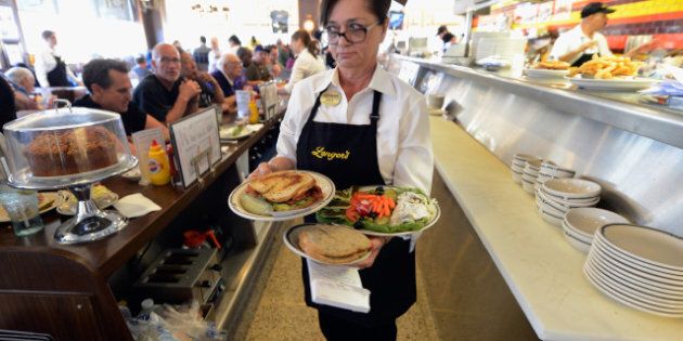LOS ANGELES, CA - FEBRUARY 26: Waitress Sheila Abramson at Langer's Delicatessen serves customers on February 26, 2013 in Los Angeles, California. According to a report, America's Jewish delis are struggling to stay afloat. There were several thousand Jewish delis open in New York City during the first half of the 20th century, now there are only a few dozen. (Photo by Kevork Djansezian/Getty Images)