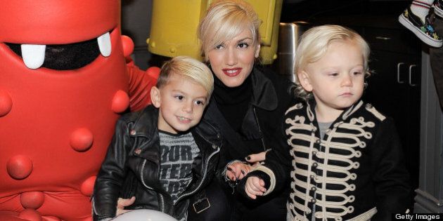 Singer Gwen Stefani with sons Kingston (L) and Zuma Rossdale meets YO GABBA GABBA! characters backstage at YO GABBA GABBA! @ KIA PRESENTS YO GABBA GABBA! LIVE! THERE'S A PARTY IN MY CITY produced by S2BN Entertainment in association with The Magic Store and W!LDBRAIN Entertainment at Nokia L.A. LIVE on November 27, 2010 in Los Angeles, California.