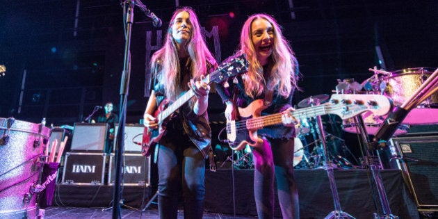 PARIS, FRANCE - NOVEMBER 30: Danielle Haim and Este Haim from Haim perform at La Gaite Lyrique on November 30, 2013 in Paris, France. (Photo by David Wolff - Patrick/Redferns via Getty Images)