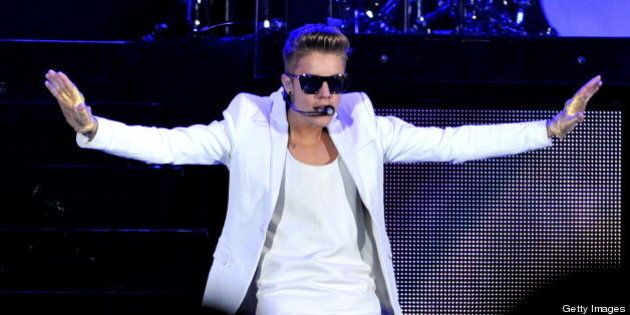 JOHANNESBURG, SOUTH AFRICA - MAY 12: (SOUTH AFRICA OUT) Justin Bieber performs at the FNB Stadium on May 12, 2013, in Johannesburg, South Africa. Bieber kicked off his 'Believe' tour in Cape Town last week. (Photo by Bongiwe Gumede/Foto24/Gallo Images/Getty Images)