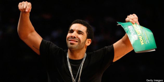 HOUSTON, TX - FEBRUARY 16: Rapper Drake reacts during the Sprite Slam Dunk Contest part of 2013 NBA All-Star Weekend at the Toyota Center on February 16, 2013 in Houston, Texas. NOTE TO USER: User expressly acknowledges and agrees that, by downloading and or using this photograph, User is consenting to the terms and conditions of the Getty Images License Agreement. (Photo by Scott Halleran/Getty Images)