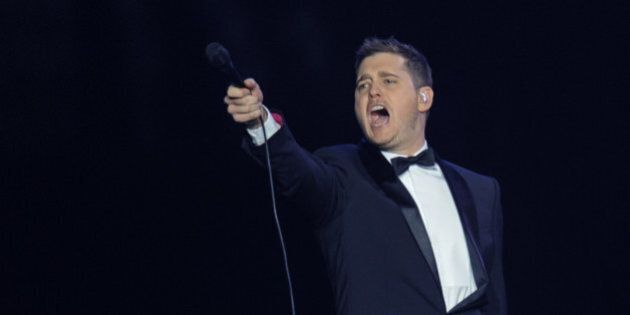PRAGUE, CZECH REPUBLIC - JANUARY 24: Canadian singer and actor Michael Buble performs live on stage during a concert on the To Be Loved Tour at O2 Arena on January 24, 2014 in Prague, Czech Republic. (Photo by Radana Jenkins/isifa/Getty Images)