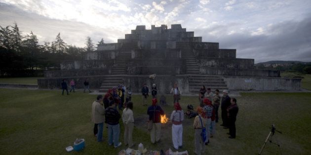 Indigenous priests take part in a Mayan ceremony at the Zaculeu archaeological site, in the Huehuetenango department, 270 km west of Guatemala City on July 21, 2012, before receiving the 'Oxlajuj B'aktun' which ends on December 21, when the current Mayan cycle known as Bactum 13, which for some experts will coincide with the end of the world. AFP PHOTO / Johan ORDONEZ (Photo credit should read JOHAN ORDONEZ/AFP/GettyImages)