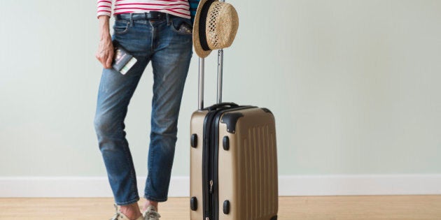 USA, New Jersey, Woman ready to go on vacations