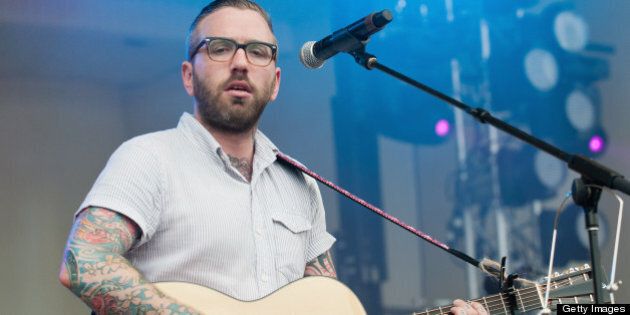 CHICAGO, IL - AUGUST 07: Dallas Green of City And Colour performs on stage during Lollapalooza Festival 2011 at Grant Park on August 7, 2011 in Chicago, United States. (Photo by Daniel Boczarski/Redferns)