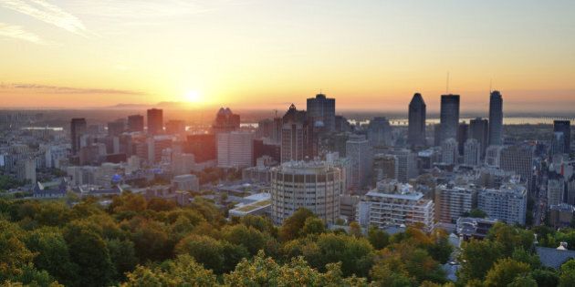Montreal sunrise viewed from Mont Royal with city skyline in the morning