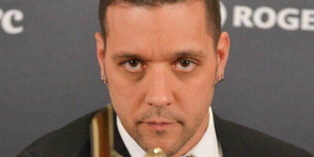 TORONTO, ON - MARCH 03: George Stroumboulopoulos, winner for the shaw media award for best host in a variety, lifestyle,reality/compettition, performing arts or talk program or series; poses in the press room at the 2013 Canadian Screen Awards at Sony Centre for the Performing Arts on March 3, 2013 in Toronto, Canada. (Photo by George Pimentel/Getty Images)
