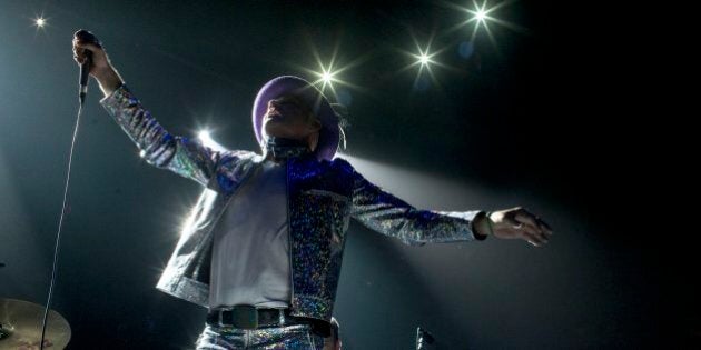 TORONTO, ON - AUG. 10: Gord Downie of The Tragically Hip performing at the Air Canada Centre in Toronto as part of the band's Man Machine Poem tour. (Marcus Oleniuk/Toronto Star via Getty Images)