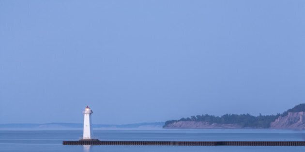 Dreamy ethereal blue dusk on Lake Ontario. Sodus Point Pierhead Lighthouse, NY, Lake Ontario, Pantone 2016 Serenity