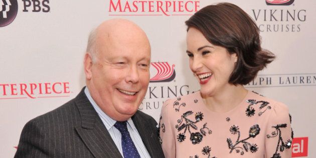 NEW YORK, NY - DECEMBER 10: Writer/executive producer Julian Fellowes and actress Michelle Dockery attend the 'Downton Abey' Season four cast photo call at Millenium Hotel on December 10, 2013 in New York City. (Photo by Stephen Lovekin/Getty Images)