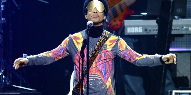 LAS VEGAS, NV - SEPTEMBER 22: Recording artist Prince performs with singer Mary J. Blige onstage during the 2012 iHeartRadio Music Festival at the MGM Grand Garden Arena on September 22, 2012 in Las Vegas, Nevada. (Photo by Isaac Brekken/Getty Images for Clear Channel)