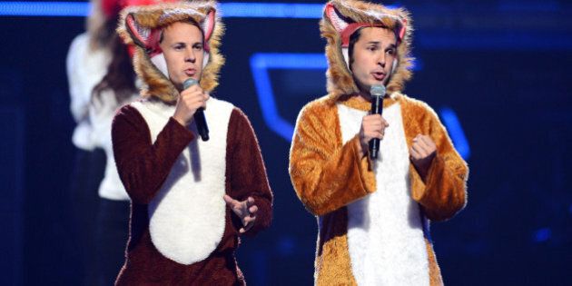 LAS VEGAS, NV - SEPTEMBER 20: Bard Ylvisaker (L) and Vegard Ylvisaker of Ylvis perform during the iHeartRadio Music Festival at the MGM Grand Garden Arena on September 20, 2013 in Las Vegas, Nevada. (Photo by Ethan Miller/Getty Images for Clear Channel)