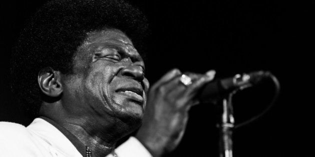 PARIS, FRANCE - NOVEMBER 08: (EDITORS NOTE: Image has been converted to black and white.) Charles Bradley performs onstage during the 'Charles Bradley and his Extraordinaires' concert at Le Trianon on November 8, 2013 in Paris, France. (Photo by Richard Bord/Getty Images)