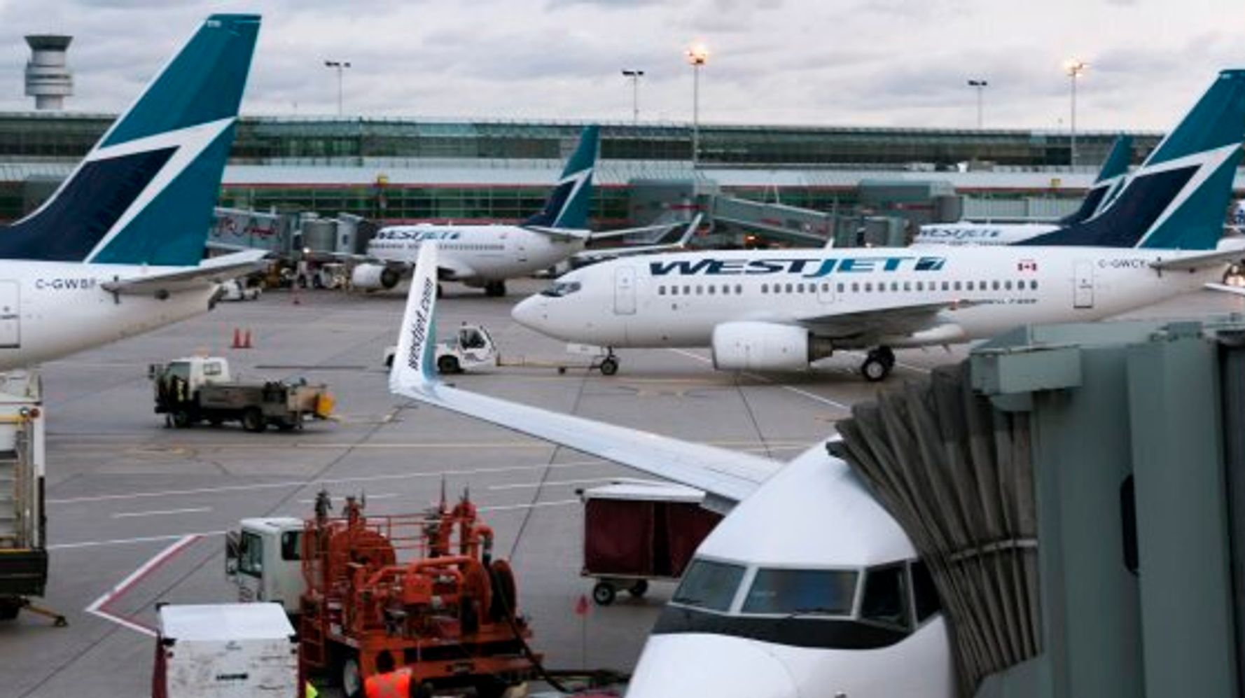 WestJet Mulls Baggage Fees As Canadian Dollar Falls, Air Fares Rise HuffPost Canada News