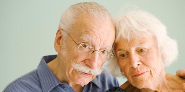 Worried senior couple