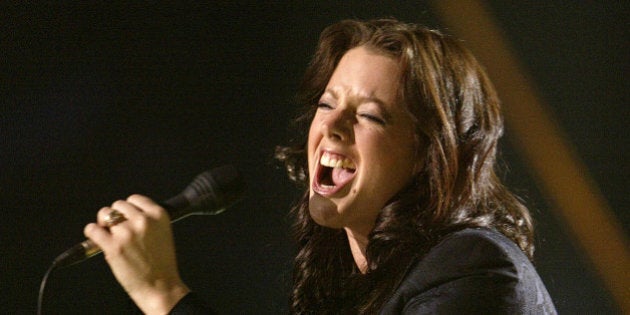 EDMONTON - APRIL 4: Singer Sarah McLachlan performs onstage at the 2004 Juno Awards at Rexall Place on April 4, 2004 in Edmonton, Alberta, Canada. The Junos celebrate excellence in Canadian music. (Photo by Carlo Allegri/Getty Images)