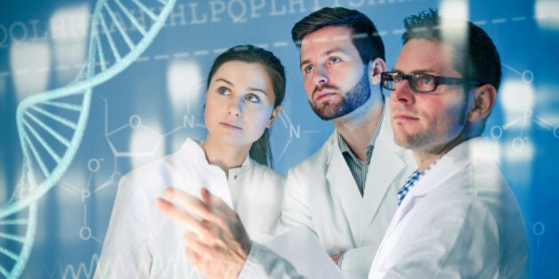 Genetic engineering. Group of scientists working at the laboratory