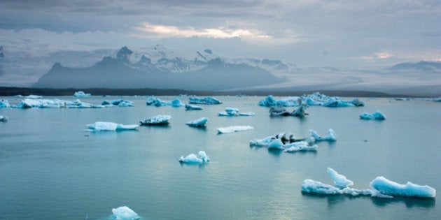 luminous blue icebergs floating ...