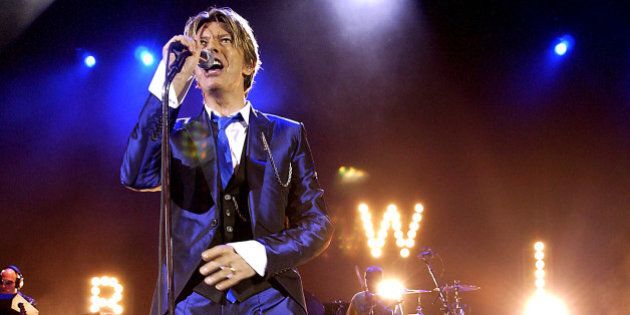 UNITED KINGDOM - OCTOBER 03: Pop Legend David Bowie In Concert, At The Hammersmith Appollo, In London, Pic Shows: David Bowie (Photo by Dave Benett/Getty Images)