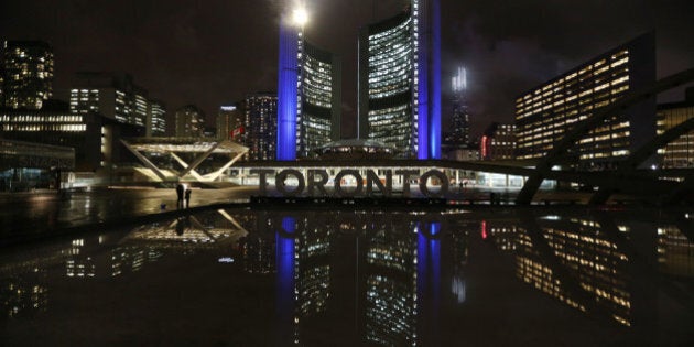 TORONTO, ON- MARCH 22: The Toronto sign by the reflecting pool in Nathan Phillips Square is turned off for the night in memory of former mayor and sitting councillor Rob Ford who died earlier in the day of a rare form of cancer at City Hall in Toronto. March 22, 2016. (Steve Russell/Toronto Star via Getty Images)