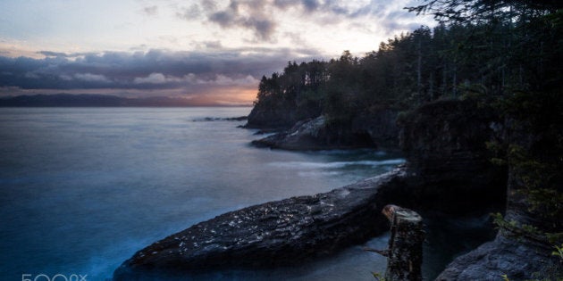 The view to the north of the overlook, just as the sun rises in the east, lighting up Vancouver Island.