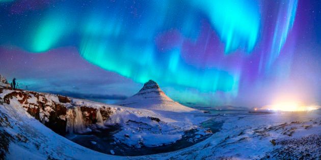 Spectacular northern lights appear over Mount Kirkjufell in Iceland.