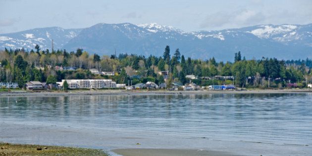 Looking across Qualicum Bay towards Qualicum Beach on Vancouver Island. A tourism and retirees destination.