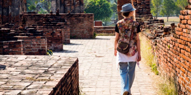 A woman traveling in Thailand. Solo travel is quite the adventure.