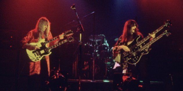 circa 1980: Canadian rock band Rush take the stage fronted by guitarist Alex Liefson (left) with singer and bassist Geddy Lee. (Photo by Hulton Archive/Getty Images)
