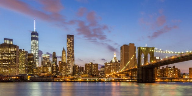 Brooklyn bridge and downtown New York City at night.