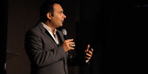 WEST HOLLYWOOD, CA - NOVEMBER 07: Comedian Russell Peters entertains the audience at the 'Heart & Soul: An Evening of High Comedy and Low Cholesterol' benefit for the Larry King Cardiac Foundation at BOA Steakhouse on November 7, 2009 in West Hollywood, California. (Photo by Michael Tullberg/Getty Images for COPE Health Solutions)